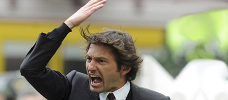 AC Milan's coach Leonardo gestures during the match against Catania in their Italian Serie A soccer match at San Siro stadium in Milan, April 11, 2010. REUTERS/Paolo Bona (ITALY - Tags: SPORT SOCCER)