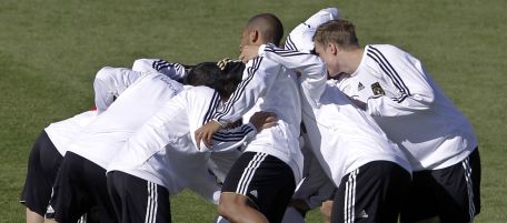 Germany players form a circle during a team training session at the Super stadium in Atteridgeville near Pretoria, South Africa, Wednesday, June 16, 2010. Germany is playing in Group D of the soccer World Cup. (AP Photo/Gero Breloer)