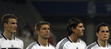 Germany's players listen to the Chinese national anthem moments before a friendly soccer match between Germany and China at Shanghai stadium in Shanghai, China, Friday, May 29, 2009. The teams tied 1-1. (AP Photo/ Elizabeth Dalziel)