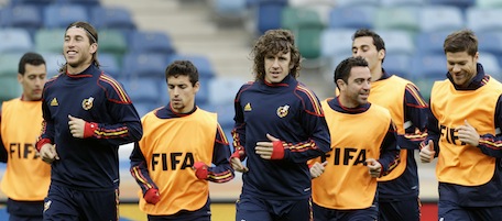 Spain's soccer players, from left to right, Sergio Busquets , Sergio Ramos, Pedrito, Carles Puyol, Xavi Hernandez, and Xabi Alonso run during a team training session at the Moses Mabhida stadium in Durban, South Africa, Tuesday, June 15, 2010. Spain play on the Group H of the soccer World Cup. (AP Photo/Daniel Ochoa de Olza)