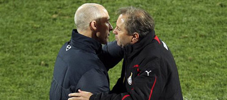 United States head coach Bob Bradley, left, and Ghana head coach Milovan Rajevac shake hands after the World Cup round of 16 soccer match between the United States and Ghana at Royal Bafokeng Stadium in Rustenburg, South Africa, on Saturday, June 26, 2010. Ghana won 2-1. (AP Photo/Themba Hadebe)