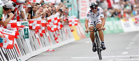 Switzerland's Fabian Cancellara of team Saxo Bank, is on his way to win the 1st stage, a 7,6 km race against the clock, from Lugano to Lugano, at the 74nd Tour de Suisse UCI ProTour cycling race, in Lugano, Switzerland, Saturday, June 12, 2010. (AP Photo/Keystone/Jean-Christophe Bott)