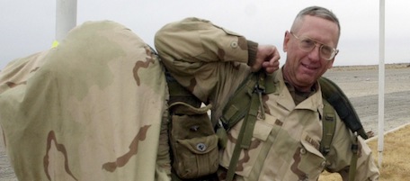 Brig. Gen. James Mattis carries his packs into the Kandahar International Airport in Kandahar, Afghanistan where he will set up operations after arriving Friday, Dec. 14, 2001. The U.S. Marines have taken control of the airfield and have the mission of making it ready to receive fixed wing aircraft. (AP Photo/Dave Martin, Pool)