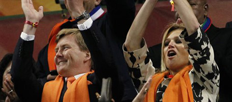 Dutch Crown Prince Willem-Alexander, left, and Princess Maxima, right, applaud before the World Cup semifinal soccer match between Uruguay and the Netherlands at the Green Point stadium in Cape Town, South Africa, Tuesday, July 6, 2010. (AP Photo/Bernat Armangue)