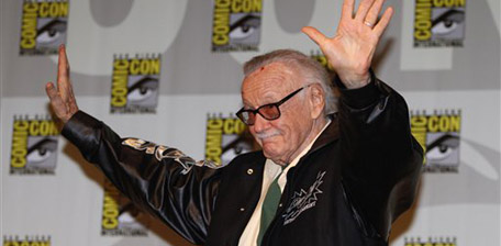 Comic creator Stan Lee waves to the crowd as he arrives for a panel at Comic-Con International Friday July 23, 2010 in San Diego. (AP Photo/Denis Poroy)