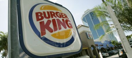 Signs point the way to a Miami Burger King restaurant Thursday, Jan. 31, 2308. Burger King Holdings Inc. said Thursday its second-quarter profit jumped 29 percent as the stalwart Whopper, the new Homestyle Melt and promotions with TV tie-ins fired up worldwide sales. (AP Photo/J. Pat Carter)