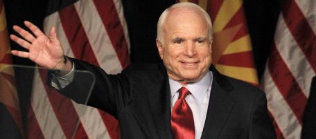 Sen. John McCain, R-Ariz., left, waves to supporters at an election victory party with his wife Cindy McCain, Tuesday, Aug. 24, 2010, in Phoenix. In McCain's toughest Republican election primary in years, beating former congressman J.D. Hayworth. (AP Photo/Ross D. Franklin)
