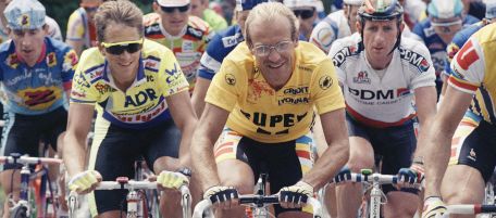 FILE - In this July 12, 1989 file photo, French rider Laurent Fignon, foreground center, overall leader of the Tour de France cycling race, rides between American rider Greg LeMond, second left, and Belgium's Rudy Dhaenens, right, during the 11th stage near Blagnac, southwestern France. Former French two-time Tour de France winner Laurent Fignon says Friday June 12, 2009 he has cancer, is undergoing chemotherapy and does not rule out that his illness could be the result of doping during his years as a top cyclist. (AP Photo/Lionel Cironneau, file)