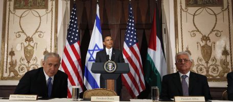 President Barack Obama makes a statement before the start of his trilateral meeting with Israeli Prime Minister Benjamin Netanyahu, left, and Palestinian President Mahmoud Abbas in New York, Tuesday, Sept. 22, 2009. (AP Photo/Charles Dharapak)