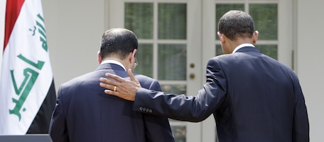 President Barack Obama walks away with Iraqi Prime Minister Nouri al-Maliki after a joint news conference in the Rose Garden of the White House in Washington, Wednesday, July 22, 2009. (AP Photo/Alex Brandon)