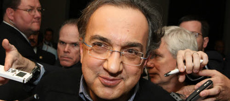 FILE - In this file photo made March 30, 2010, CEO Sergio Marchionne, Chrysler Group LLC, speaks to reporters after the Automotive Forum 2010 in New York. Chrysler Group LLC said Monday, Aug. 9, 2010, that growing car and truck sales helped it narrow its second-quarter loss to $172 million. (AP Photo/Jin Lee, File)