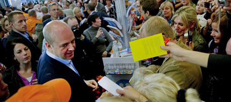 Swedish Prime Minister Fredrik Reinfeldt, second left, is surrounded by supporters, at a shopping mall in Gothernburg, Sweden, Saturday, Sept. 18, 2010. Sweden's leftwing opposition is closing in on the government's lead, while the extreme right seems set to enter parliament according to several polls published today, one day before the Sept. 19 general elections. But Prime Minister Fredrik Reinfeldt's chances of a historic re-election don't only depend on defeating the opposition bloc led by the Social Democrats, who have lost their dominance of politics in the Scandinavian welfare state. (AP Photo/Adam Ihse)