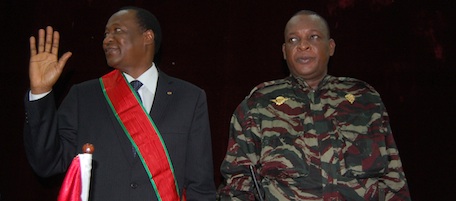 Burkina Faso President Blaise Compaore, left, poses for a picture with Gen. Sekouba Konate, the junta chief who steered Guinea toward elections, during a meeting between Compaore and Guinea's political actors at the People's Palace in Conakry, Guinea Tuesday, Aug. 3, 2010. Compaore pushed Guinea's transitional government, presidential candidates, and election officials - who have yet to set a date for a second round of presidential voting after June 27 polls were marred by claims of fraud - to hold the run-off "as quickly as possible." (AP Photo/Idrissa Soumare)