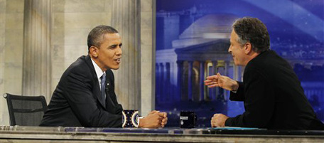 President Barack Obama is pictured during a commercial break as he talks with host Jon Stewart as he takes part in a taping of Comedy Central's The Daily Show with Jon Stewart in Washington, Wednesday, Oct. 27, 2010. (AP Photo/Charles Dharapak)