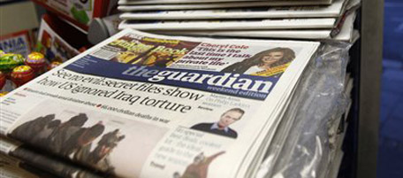 Newspapers headlining WikiLeaks story are seen on sale at a newsagent in Wimbledon, southwest London, Saturday, Oct. 23, 2010. WikiLeaks the online whistle-blower web site are to release some U.S. secret documents on the war in Iraq. (AP Photo/Sang Tan)