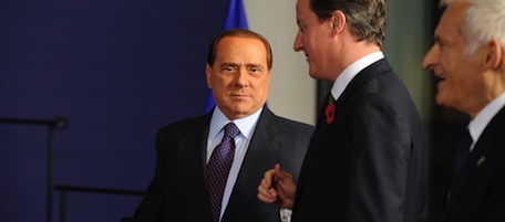 Italian Prime Minister Silvio Berlusconi, British Prime Minister David Cameron and European Parliament President Jerzy Buzek arrive for a family photo of a European Union summit at the European Council headquarters on October 28, 2010 in Brussels. European leaders moved towards a painful compromise Thursday that would open the door to risky treaty change, a German demand to tighten EU budgetary discipline following the Greek debt crisis. AFP PHOTO / ERIC FEFERBERG (Photo credit should read ERIC FEFERBERG/AFP/Getty Images)