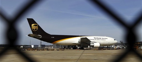 A UPS cargo jet sits at the terminal at Dulles International Airport on Saturday, Oct. 30, 2010 in Chantilly, Va. (AP Photo/Jose Luis Magana)