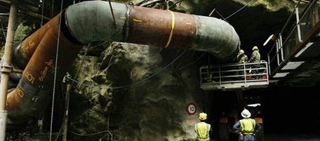 In this photo taken on Feb. 22, 2008, men work on the air-flow system of Pike River Coal Mine mine near Atarau, New Zealand. An explosion ripped through the coal mine on Friday, Nov. 19, 2010, and around 30 workers were unaccounted for, police and the mining company said. (AP Photo/New Zealand Herald, Greg Bowker) NEW ZEALAND OUT, FAIRFAX AUSTRALIA OUT