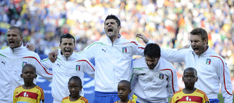 Italian players sing their national anthem before the Group F first round 2010 World Cup football match Italy versus Slovakia on June 24, 2010 at Ellis Park stadium in Johannesburg. NO PUSH TO MOBILE / MOBILE USE SOLELY WITHIN EDITORIAL ARTICLE - AFP PHOTO / FILIPPO MONTEFORTE (Photo credit should read FILIPPO MONTEFORTE/AFP/Getty Images)