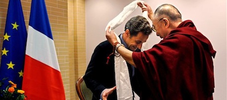 French President Nicolas Sarkozy, left, is welcomed by the Dalai Lama in Gdansk, Poland, Saturday, Dec. 6, 2008. French President Nicolas Sarkozy was holding a long-awaited meeting with the Dalai Lama in the face of sharp protests from Beijing. The French president and the Tibetan spiritual leader were meeting in Gdansk on Saturday during celebrations marking the 25th anniversary of former Polish President Lech Walesa's Nobel Peace Prize. (AP Photo/Eric Feferberg, Pool)