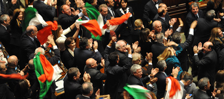 Supporters of Italian prime minister Silvio berlusconi celebrate after a confidence vote at the Chamber of Deputies, the lower house, on December 14, 2010 in Rome. italian Prime Minister Silvio Berlusconi scraped through a crucial confidence vote in the lower house of parliament by 314 votes in favour and 311 against. AFP PHOTO / ANDREAS SOLARO (Photo credit should read ANDREAS SOLARO/AFP/Getty Images)