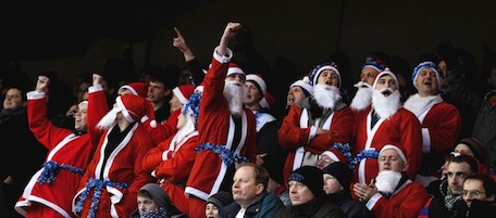 NOTTINGHAM, ENGLAND - DECEMBER 18: Crystal Palace fans dressed in Santa costumes brave the freezing temperatures during the npower Championship match between Nottingham Forest and Crystal Palace at the City Ground on December 18, 2010 in Nottingham, England. (Photo by Laurence Griffiths/Getty Images)