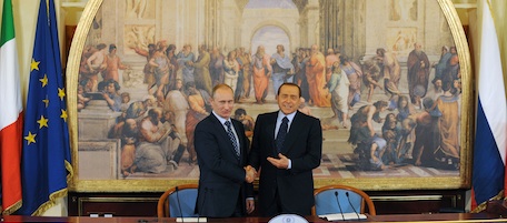 Italian Prime Minister Silvio Berlusconi (R) and his Russian counterpart Vladimir Putin shake hands at the end of a press conference during their meeting at the Villa Gernetto on April 26, 2010 in Lesmo near Monza. 
AFP PHOTO / GIUSEPPE CACACE (Photo credit should read GIUSEPPE CACACE/AFP/Getty Images)