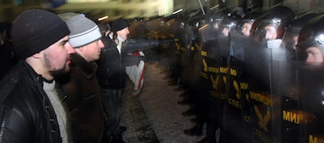 Protesters clash with riot police during a rally in Minsk early on December 20, 2010. Tens of thousands of protestors massed in Minsk against elections that exit polls said were swept by President Alexander Lukashenko, attacking government buildings and clashing with police. AFP PHOTO/ ANDREY SMIRNOV CORRECTING BYLINE (Photo credit should read ANDREY SMIRNOV/AFP/Getty Images)