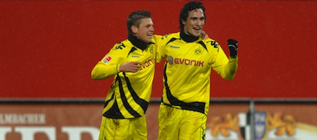 GERMANY : RESTRICTIONS / EMBARGO - ONLINE CLIENTS MAY USE UP TO SIX IMAGES DURING EACH MATCH WITHOUT THE AUTHORISATION OF THE DFL. NO MOBILE USE DURING THE MATCH AND FOR A FURTHER TWO HOURS AFTERWARDS IS PERMITTED WITHOUT THE AUTHORISATION OF THE DFL. 

Dortmund's defender Mats Hummels (R) and his teammate Dortmund's Polish midfielder Lukasz Piszczek (L) celebrate after scoring during the German first division Bundesliga football match between 1. FC Nuremberg and Borussia Dortmund in Nuremberg, southern Germany, December 5, 2010. AFP PHOTO/CHRISTOF STACHE (Photo credit should read CHRISTOF STACHE/AFP/Getty Images)