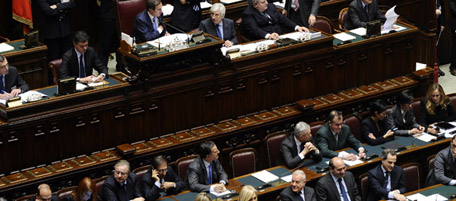 The speaker of Italy's parliament Gianfranco Fini (C) takes place for a session of the parliament on the "Franceschini motion" attended by Italian Prime Minister Silvio Berlusconi (not pictured) on December 13, 2010 in Rome. Berlusconi earlier in the day offered to strike a deal with his centre-right opponents on the eve of a crucial confidence vote at the parliament, warning a political crisis would be "folly." AFP PHOTO / FILIPPO MONTEFORTE (Photo credit should read FILIPPO MONTEFORTE/AFP/Getty Images)