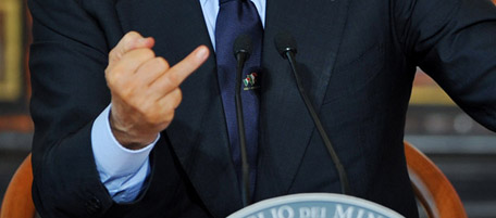 Italy's Prime Minister Silvio Berlusconi gives his end of the year press conference at Villa Madama in Rome on December 23, 2010. AFP PHOTO / ANDREAS SOLARO (Photo credit should read ANDREAS SOLARO/AFP/Getty Images)