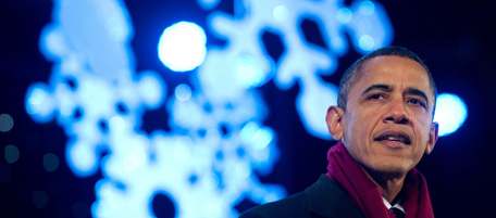 US President Barack Obama speaks during the National Christmas Tree Lighting ceremony on the Ellipse near the White House in Washington, DC, December 9, 2010. AFP PHOTO / Saul LOEB (Photo credit should read SAUL LOEB/AFP/Getty Images)