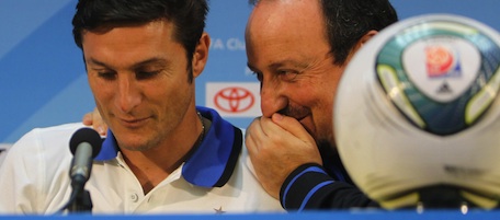 Inter Milan's coach Rafael Benitez (R) talks to Argentine defender Javier Zanetti during a press conference held at Zayed Sports City in the Emirati capital Abu Dhabi on December 17, 2010 on the eve of the FIFA Club World Cup final. AFP PHOTO/KARIM JAAFAR (Photo credit should read KARIM JAAFAR/AFP/Getty Images)