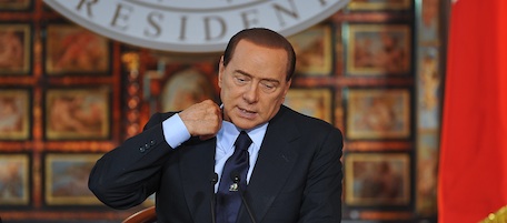 Italian Prime Minister Silvio Berlusconi gives his end of the year press conference at Villa Madama in Rome on December 23, 2010. AFP PHOTO / ANDREAS SOLARO (Photo credit should read ANDREAS SOLARO/AFP/Getty Images)