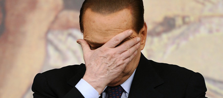 Italain Prime Minister Silvio Berlusconi reacts during a press conference on January 26, 2011 at Palazzo Chigi in Rome following a meeting on the Expo Milan that will take place in 2015. Prosecutors submitted fresh documents to the Italian Chamber of Deputies the same day to bolster their request for permission to raid various offices linked to Silvio Berlusconi amid a raging sex scandal. AFP PHOTO / FILIPPO MONTEFORTE (Photo credit should read FILIPPO MONTEFORTE/AFP/Getty Images)