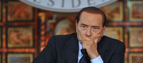 Italian Prime Minister Silvio Berlusconi gives his end of the year press conference at Villa Madama in Rome on December 23, 2010. AFP PHOTO / ANDREAS SOLARO (Photo credit should read ANDREAS SOLARO/AFP/Getty Images)