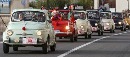 Italian cars Fiat 500 parade at the harbour of Monaco, during the 1st International Rally of Fiat 500 (model 1957 to 1975), Wednesday, Dec. 15, 2010. All vehicles participate in a Concours d'Elegance in Monaco.(AP Photo/Lionel Cironneau)