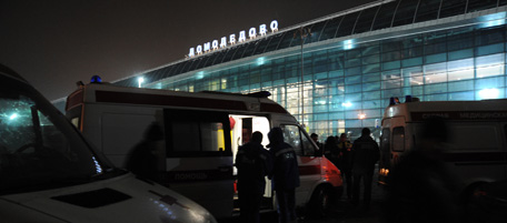 Ambulance cars wait outside Moscow's Domodedovo international airport on January 24, 2011, shortly after an explosion. A suspected suicide bombing on January 24 killed at least 31 people and wounded over 100 at the airport in an attack described by investigators as an act of terror. Eyewitnesses, who spoke to Russian radio, described a scene of carnage after the blast ripped through the baggage claims section of the arrivals hall at Russia's largest airport. AFP PHOTO / ANDREY SMIRNOV (Photo credit should read ANDREY SMIRNOV/AFP/Getty Images)