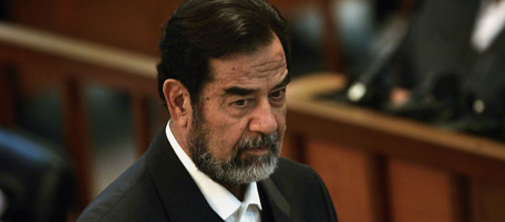 BAGHDAD, IRAQ - DECEMBER 7: Saddam Hussein attends a session in court during the 'Anfal' trial against him on December 7, 2006 in Baghdad, Iraq. The trial continues on charges of murdering Kurds during the 1987-88 Anfal campaign. (Photo by Chris Hondros/Getty Images)