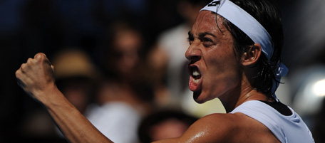 Francesca Schiavone of Italy reacts after a point against Svetlanda Kuznetsova of Russia during their round four women's singles match on the seventh day of the Australian Open tennis tournament in Melbourne on January 23, 2011. The match was tied one set all with play continuing in the third set. IMAGE STRICTLY RESTRICTED TO EDITORIAL USE Ð STRICTLY NO COMMERCIAL USE AFP PHOTO / GREG WOOD (Photo credit should read GREG WOOD/AFP/Getty Images)