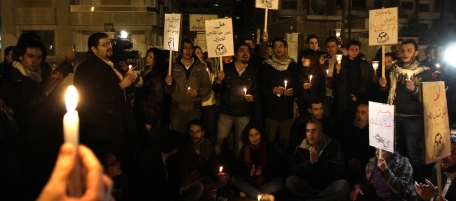 Syrians hold candels during a sit-in outside the Egyptian embassy in Damascus on January 29, 2011. Placards read: "Yes to Freedom, Mubarak Go Away, No to Mubarak, Mubarak Leave". AFP PHOTO/ LOUAI BESHARA (Photo credit should read LOUAI BESHARA/AFP/Getty Images)