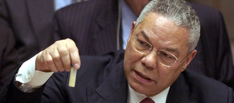 US Secertary of State Colin Powel holds up a vival that he said could contain anthrax during a meeting of the United Nations Security Council, Wednesday, Feb. 5, 2003. (AP Photo/Elise Amendola)