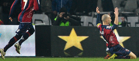 FC Bologna's forward Marco Di Vaio (R) celebrates after scoring against Juventus during their Italian Serie A football match on February 26, 2011 at Turin's Olympic stadium. AFP PHOTO / ANDREAS SOLARO (Photo credit should read ANDREAS SOLARO/AFP/Getty Images)