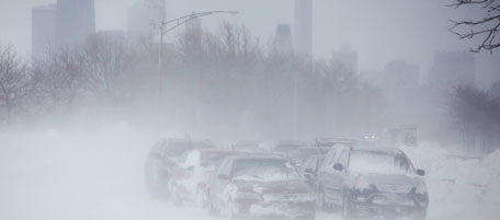 Hundreds of cars are seen stranded on Lake Shore Drive, Wednesday, Feb. 2, 2011 in Chicago. A winter blizzard of historic proportions wobbled an otherwise snow-tough Chicago, stranding hundreds of drivers for up to 12 hours overnight on the city's showcase lakeshore thoroughfare and giving many city schoolchildren their first ever snow day. (AP Photo/Kiichiro Sato)