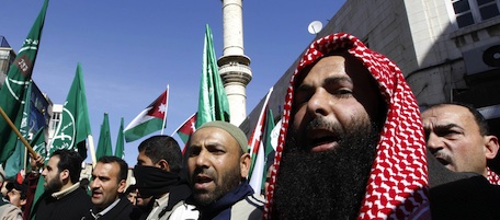 Thousands of Jordanians demonstrated peacefully in Amman and other cities after weekly prayers on Friday to press for political and economic reform, and demanding that the government resign. AFP PHOTO/KHALIL MAZRAAWI (Photo credit should read KHALIL MAZRAAWI/AFP/Getty Images)