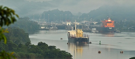 Cargo ships wait to enter the Pedro Miguel lock in the route of the Panama Canal on August 19, 2008 in Panama City. Panamanian President Martin Torrijos (out of frame) visited the area to inspect the advances of the works of enlagement, which are in a 50 percent. The final cost of the works is estimated in 5.250 millon dollars, informed the Panama Canal Authority (ACP), Alberto Aleman. AFP PHOTO/Elmer MARTINEZ (Photo credit should read ELMER MARTINEZ/AFP/Getty Images)