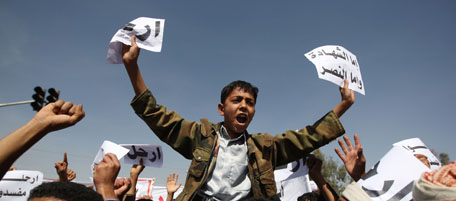 Yemeni anti-government protesters chant slogans calling for the ouster of President Ali Abdullah Saleh during a demonstration in the capital Sanaa on February 21, 2011 as the veteran strongman, in power since 1978, said that only defeat at the ballot box will make him quit. AFP PHOTO/AHMAD GHARABLI (Photo credit should read AHMAD GHARABLI/AFP/Getty Images)