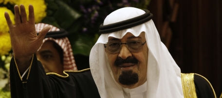 ** FOR STORY ARABIA SAUDI-FATWAS ** FILE - In this March 24, 2009 file photo, King Abdullah bin Abdul Aziz al-Saud of Saudi Arabia, waves to members of the Saudi Shura "consultative" council in Riyadh, Saudi Arabia. King Abdullah is moving to regain control over an abundance of fatwas. Under a royal decree issued in mid-August 2010, only clerics on the government-appointed panel may issue the fatwas that answer every question of how pious Saudis should live their lives. (AP Photo/Hassan Ammar, File)