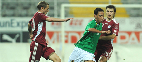 ANTALYA, TURKEY - FEBRUARY 09: Mauricio Sausedo of Bolivia is challenged by Maksims Rafalaskis (R) and Andrejs Rubins (L) of Latvia during the international friendly match between Latvia and Bolivia at Mardan Sports Complex stadium on February 9, 2011 in Antalya, Turkey. (Photo by Valerio Pennicino/Getty Images) *** Local Caption *** Maksims Rafalaskis;Mauricio Sausedo;Andrejs Rubins
