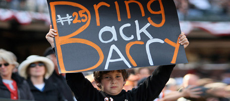 SAN FRANCISCO - APRIL 7: A young San Francisco Giants fan holds a sign imploring the Giants to Bring Back Barry (Bonds) during the opening day game against the San Diego Padres on April 7, 2008 at AT&amp;T Park in San Francisco, California. The Padres defeated the Giants 8-4. (Photo by Greg Trott/Getty Images) *** Local Caption *** Barry Bonds